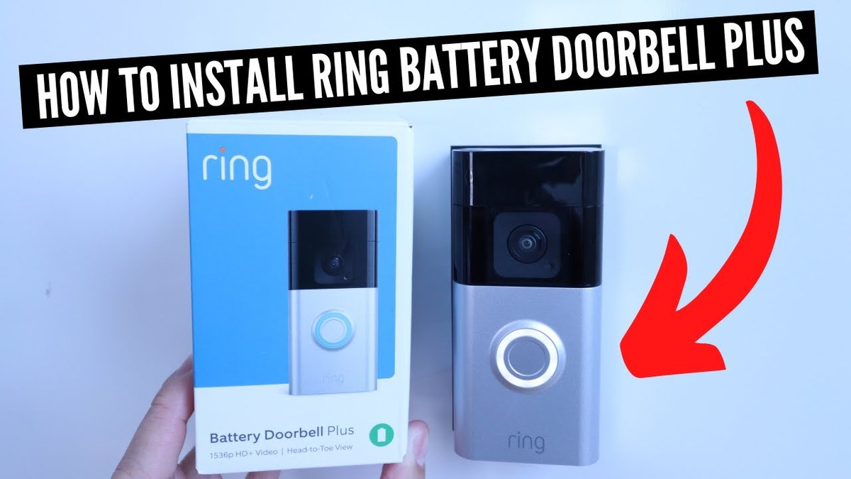 Hands installing a Ring Battery Doorbell mount and securing the device on a door frame