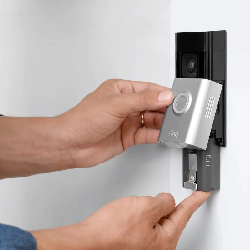 Smart home security setup showing power, Wi‑Fi, and storage compatibility icons for a video doorbell