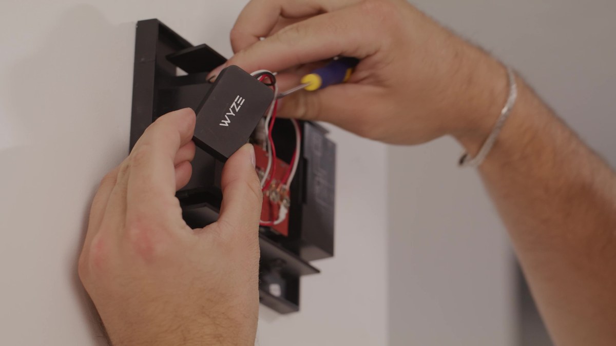 Home security setup diagram showing compatibility check, power source, and mounting location for a video doorbell